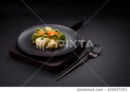 Delicious fresh vegetables steamed carrots, broccoli, cauliflower 109947263