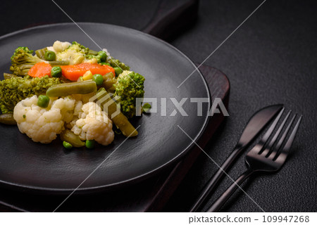 Delicious fresh vegetables steamed carrots, broccoli, cauliflower 109947268