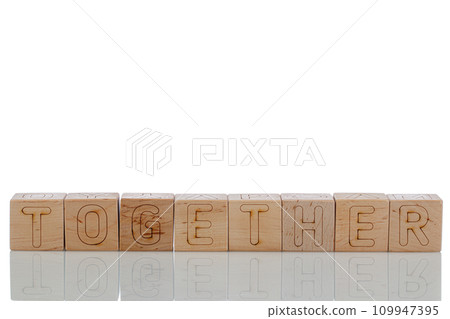 Wooden cubes with letters together on a white background 109947395