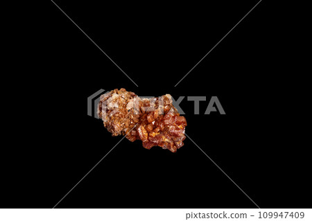 Macro mineral stone Vanadinite on a black background 109947409