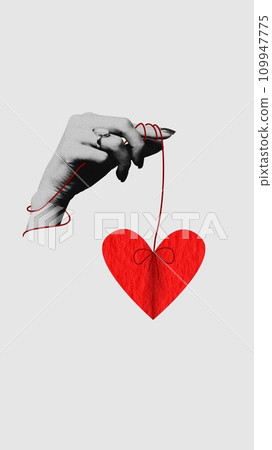 Female hand holding papercut heart on string. Contemporary art collage. Minimalism. Valentine's day 109947775