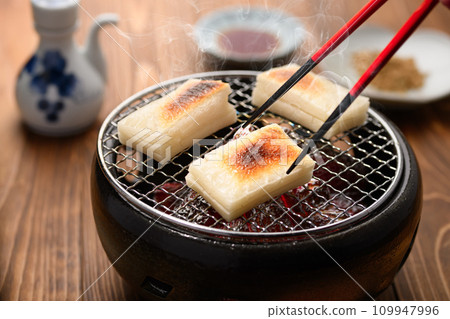 Slowly baked cut mochi Slowly baked cut mochi 109947996