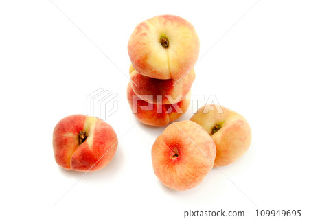Several saturn peaches or flat peaches isolated on white background with clipping path.. Several saturn peaches or flat peaches isolated on white background with clipping path.. 109949695
