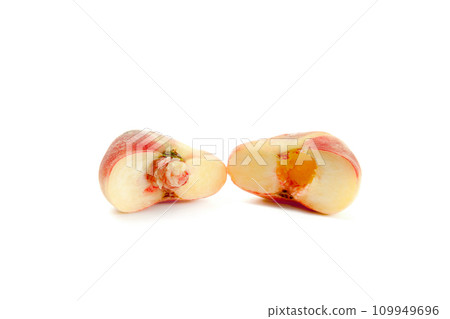 Half of saturn peach or flat peach isolated on white background with clipping path.. 109949696