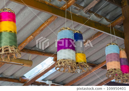 Stack of colorful silk rolls 109950401