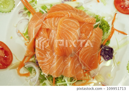 Top view fresh salmon served with vegetable Top view fresh salmon served with vegetable 109951713