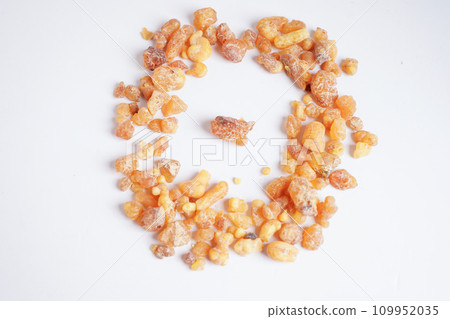 Frankincense or olibanum aromatic resin isolated on white background used in incense and perfumes. Frankincense or olibanum aromatic resin isolated on white background used in incense and perfumes. 109952035