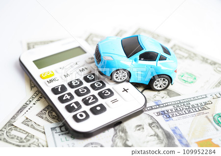 Bangkok, Thailand November 18, 2023 Car on banknote money, buying or insurance concept. 109952284