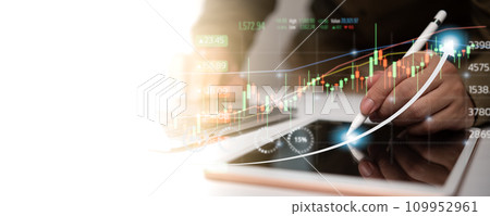 Businessman analysis graph stock market and financial , investment strategy and data report growth... 109952961