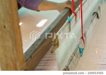 Part of a loom for homemade silk production Thailand 109953485