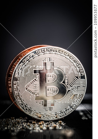 Shiny silver and copper bitcoins 109953877