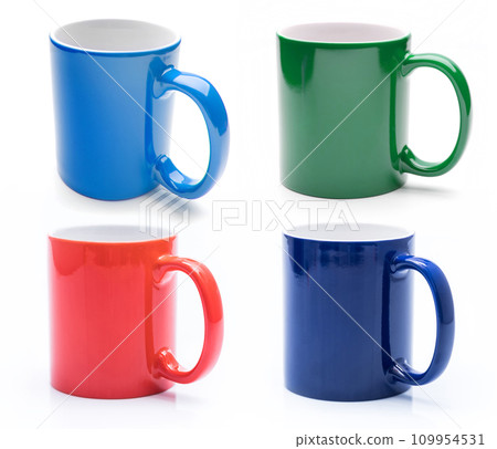 Set of four shiny colorful mugs isolated 109954531