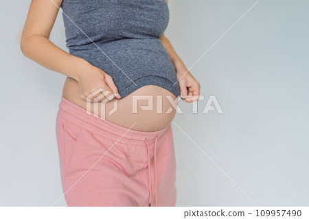 No need to struggle with the fastening. Choose a maternity dress that provides comfort and style to your pregnant belly No need to struggle with the fastening. Choose a maternity dress that provides comfort and style to your pregnant belly 109957490