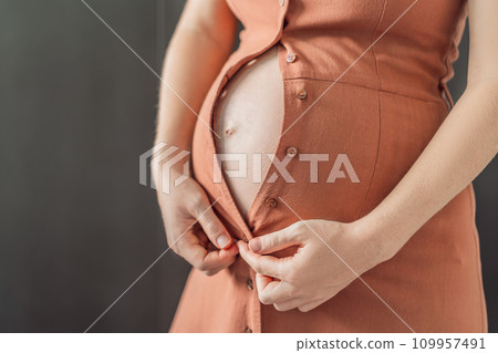 No need to struggle with the fastening. Choose a maternity dress that provides comfort and style to your pregnant belly No need to struggle with the fastening. Choose a maternity dress that provides comfort and style to your pregnant belly 109957491