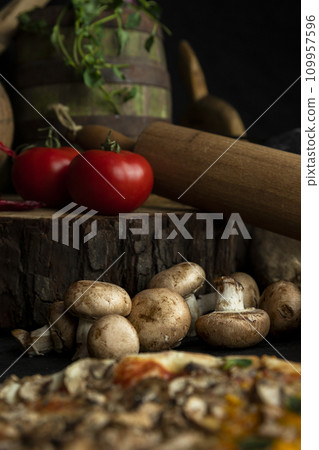 Champignon mushrooms with other ingrediants in the kitchen Champignon mushrooms with other ingrediants in the kitchen 109957596
