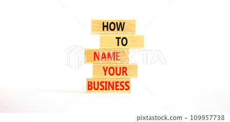 How to name your business symbol. Concept words How to name your business on wooden blocks. Beautiful white table white background. How to name your business concept. Copy space. How to name your business symbol. Concept words How to name your business on wooden blocks. Beautiful white table white background. How to name your business concept. Copy space. 109957738