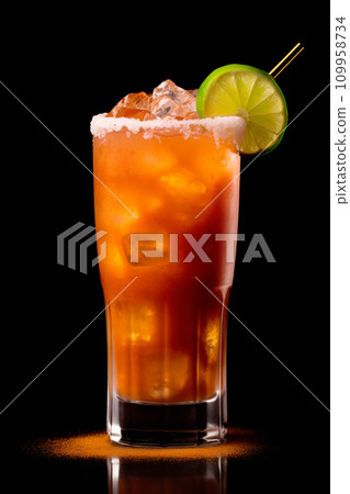Michelada cocktail in beer glass featuring with beer, lime juice, tomato juice, spicy sauce and spices on black. Michelada cocktail in beer glass featuring with beer, lime juice, tomato juice, spicy sauce and spices on black. 109958734
