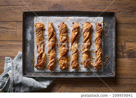 freshly baked pastries with chocolate cream and almonds freshly baked pastries with chocolate cream and almonds 109959841