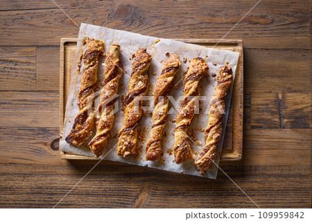 freshly baked pastries with chocolate cream and almonds freshly baked pastries with chocolate cream and almonds 109959842