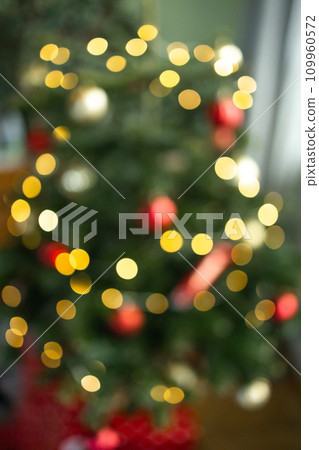 2024 Blur Christmas scene with decoreted tree and lights in background 2024 Blur Christmas scene with decoreted tree and lights in background 109960572