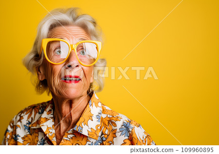 AI-generated content. An elderly lady, 70 years old, with a bright yellow floral shirt and big glasses against yellow background 109960895