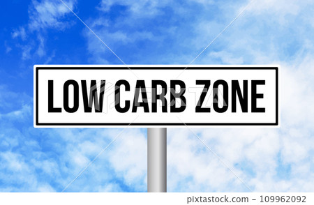 Low carb zone road sign on blue sky background 109962092