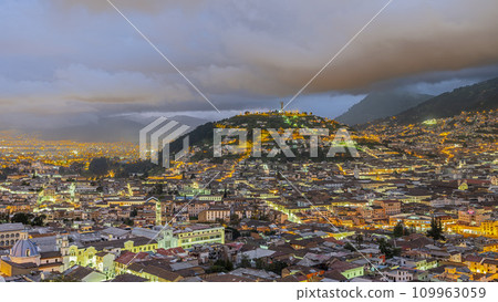 Panecillo hill Virgen of Quito statue and old colonial center of Quito at blue hour 109963059