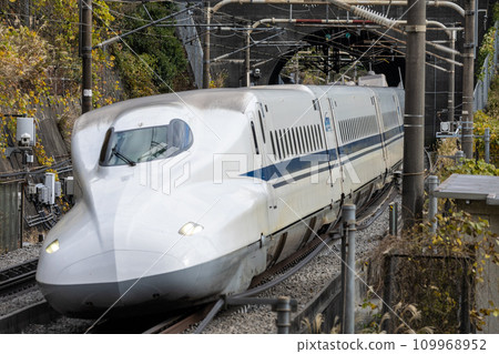 Tokaido Shinkansen emerging from the tunnel 109968952