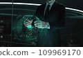 Businessman with Build Your Brand hologram concept 109969170