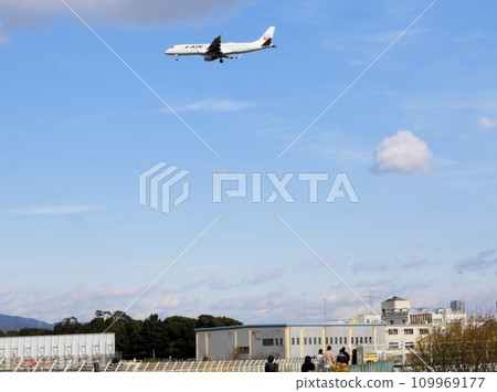 Itami Airport seen from the Senri River bank Itami Airport seen from the Senri River bank 109969177