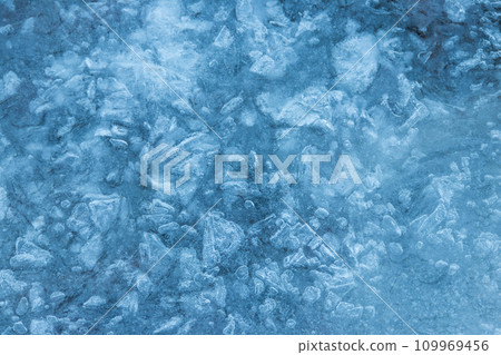 Texture of the ice surface. Winter background Texture of the ice surface. Winter background 109969456
