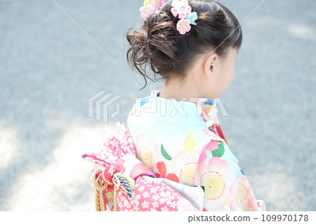 Profile of a girl wearing traditional clothes at Shichi-Go-San Profile of a girl wearing traditional clothes at Shichi-Go-San 109970178