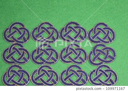 Awaji knot on green background Awaji knot on green background 109971167