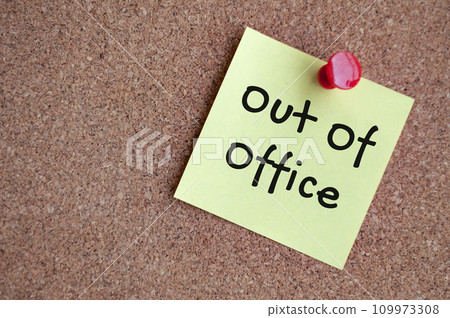 Out of office text on sticky note. Out of office concept. 109973308
