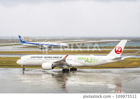 Rainy airport, plane taxiing, Naha City, Okinawa Prefecture Rainy airport, plane taxiing, Naha City, Okinawa Prefecture 109973511