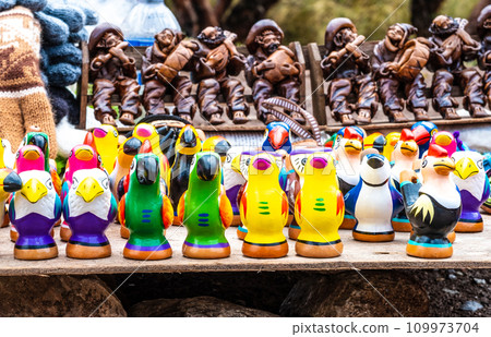 Colorful bird whistles on the street shop in Peru Colorful bird whistles on the street shop in Peru 109973704