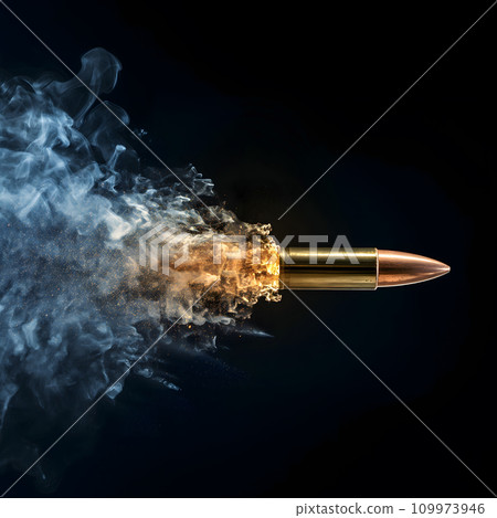 Bullet on a black background in smoke 109973946
