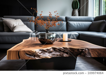 Exclusive luxury table made of natural slab of expensive wood close-up in a modern room 109974064