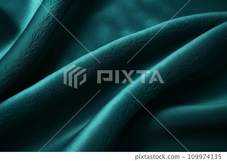 Elegant velvet fabric background. Teal green velour flows in waves and folds 109974135