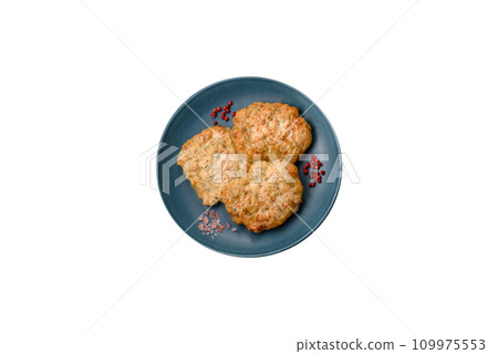 Delicious fresh fried minced fish cutlets with spices and herbs Delicious fresh fried minced fish cutlets with spices and herbs 109975553