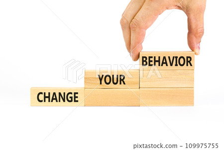 Motivation and Change your behavior symbol. Concept words Change your behavior on wooden block on a beautiful white table white background. Business change your behavior concept. Copy space. 109975755