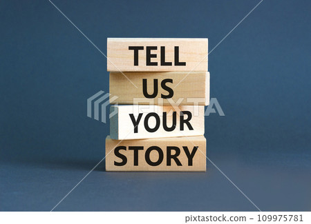 Tell us your story symbol. Concept word Tell us your story on beautiful wooden block. Beautiful grey table grey background. Business tell us your story concept. Copy space. Tell us your story symbol. Concept word Tell us your story on beautiful wooden block. Beautiful grey table grey background. Business tell us your story concept. Copy space. 109975781