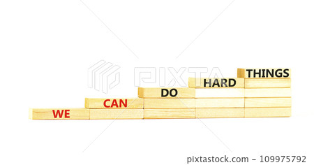We can do hard things symbol. Concept words We can do hard things on wooden blocks stairs. Beautiful white table white background. Business, we can do hard things concept. Copy space. 109975792