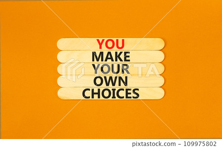 You make your own choice symbol. Concept words You make your own choice on wooden stick. Beautiful orange table orange background. Business you make your own choice concept. Copy space. You make your own choice symbol. Concept words You make your own choice on wooden stick. Beautiful orange table orange background. Business you make your own choice concept. Copy space. 109975802