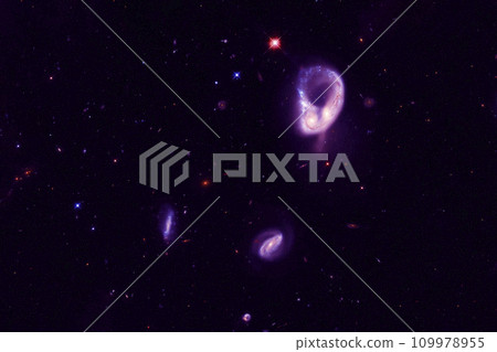 A distant galaxy in deep space. Elements of this image furnished by NASA 109978955