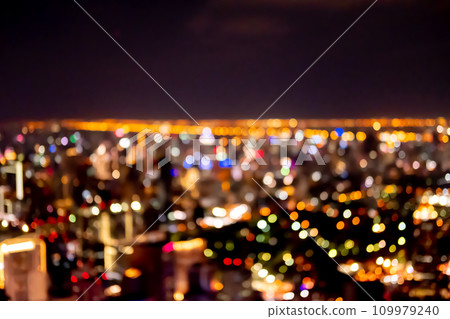 Blurred image bokeh of Bangkok cityscape, night top view in the business district in Thailand. Blurred image bokeh of Bangkok cityscape, night top view in the business district in Thailand. 109979240