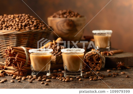 Irish cream and coffee liqueur on a brown background. 109979399