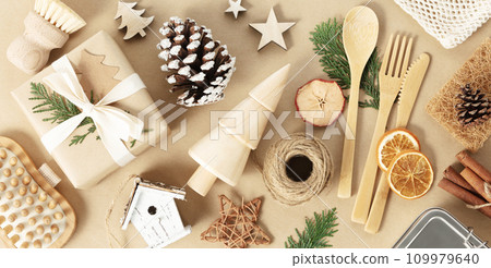 Wooden Christmas decorations on beige background, retro style, eco friendly trendy zero waste 109979640