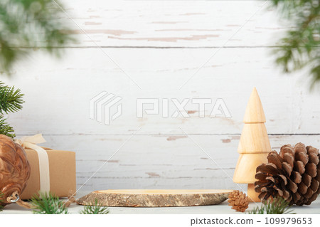 Wooden podium and christmas decorations on grey background. 109979653