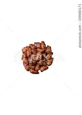 Chicken hearts fried in soy sauce with salt and spices in a plate 109980171